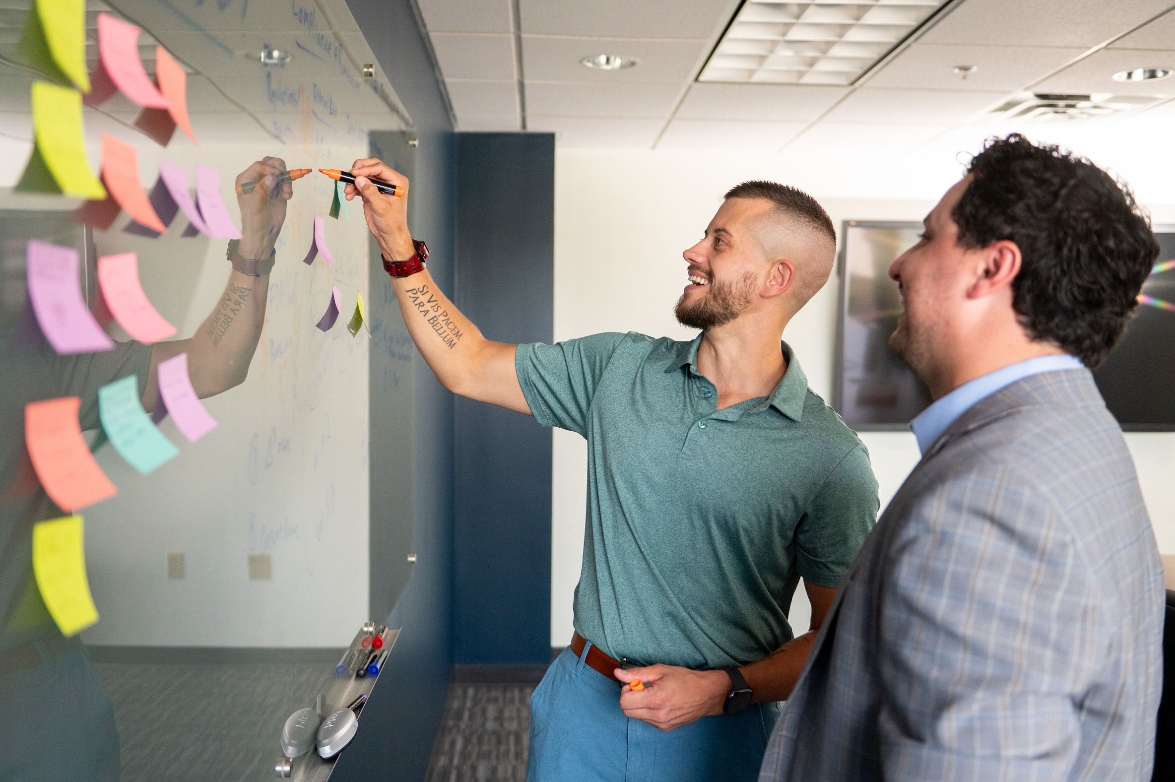 Team brainstorming DevSecOps strategies with sticky notes