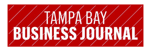 Logo for Tampa Bay Business Journal with text in white block letters and background of deep red with pale red diagonal lines